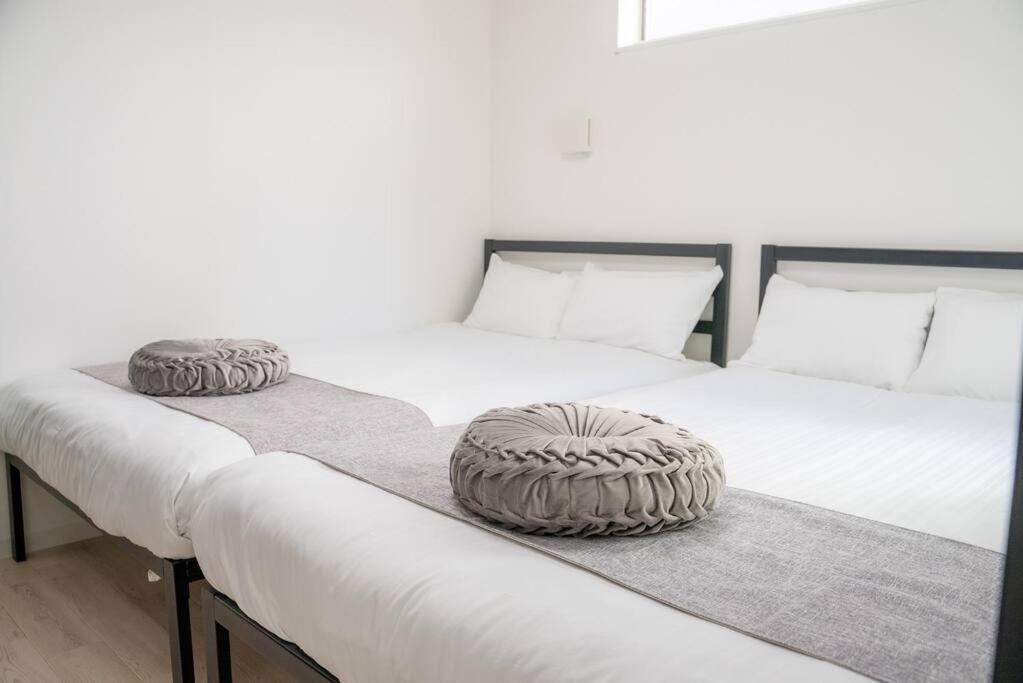 Residential Hotel Glitter Usjまで1駅5分 Oszaka Szoba fotó