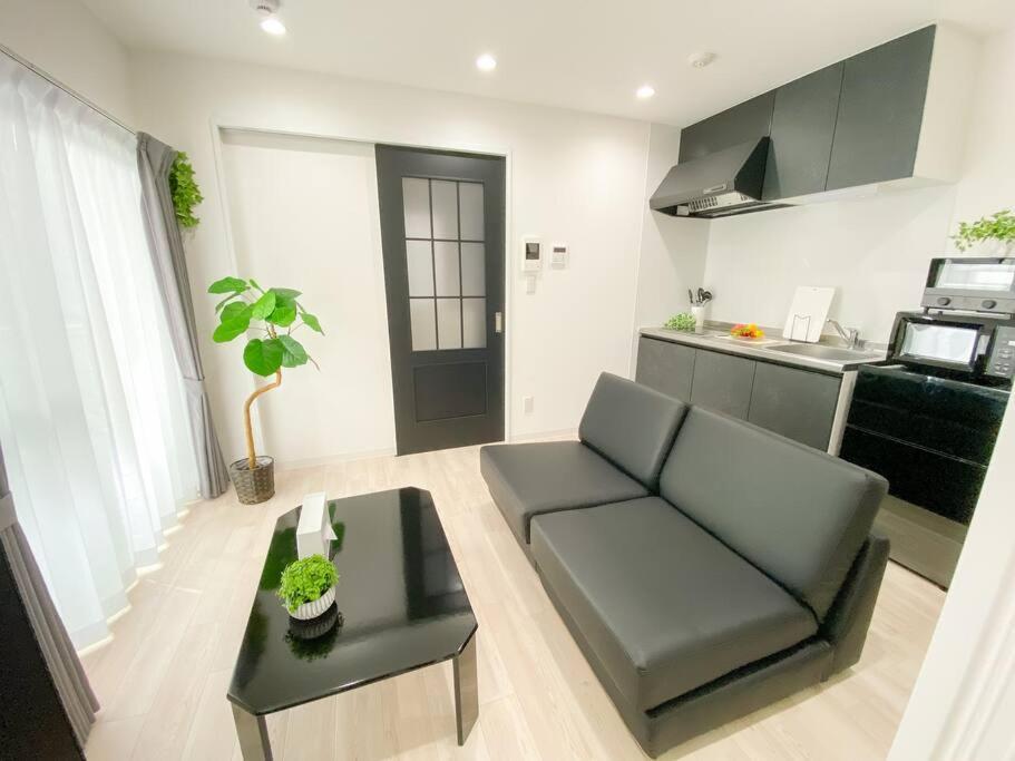 Residential Hotel Glitter Usjまで1駅5分 Oszaka Szoba fotó