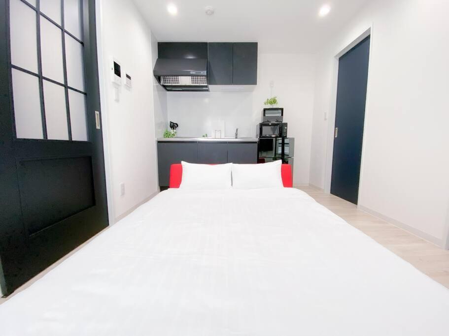 Residential Hotel Glitter Usjまで1駅5分 Oszaka Szoba fotó