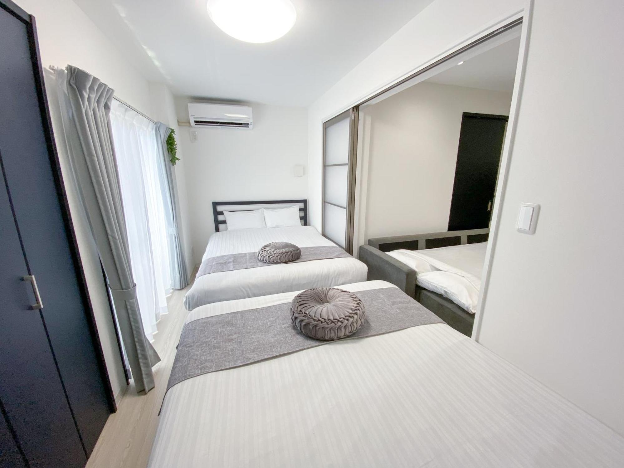 Residential Hotel Glitter Usjまで1駅5分 Oszaka Szoba fotó