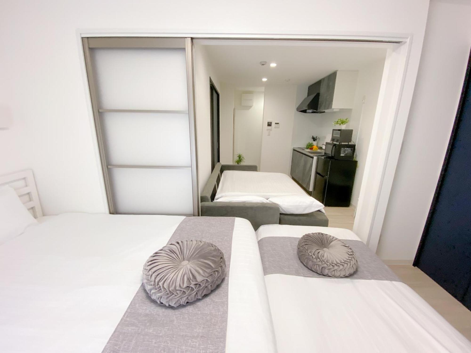 Residential Hotel Glitter Usjまで1駅5分 Oszaka Kültér fotó