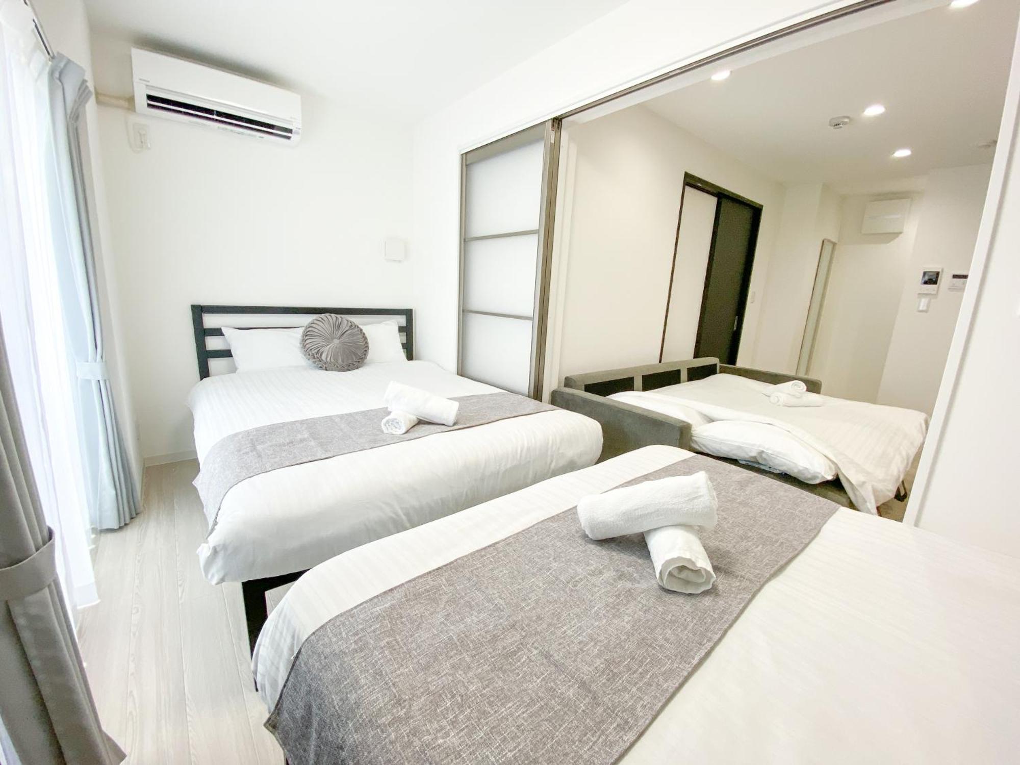 Residential Hotel Glitter Usjまで1駅5分 Oszaka Szoba fotó